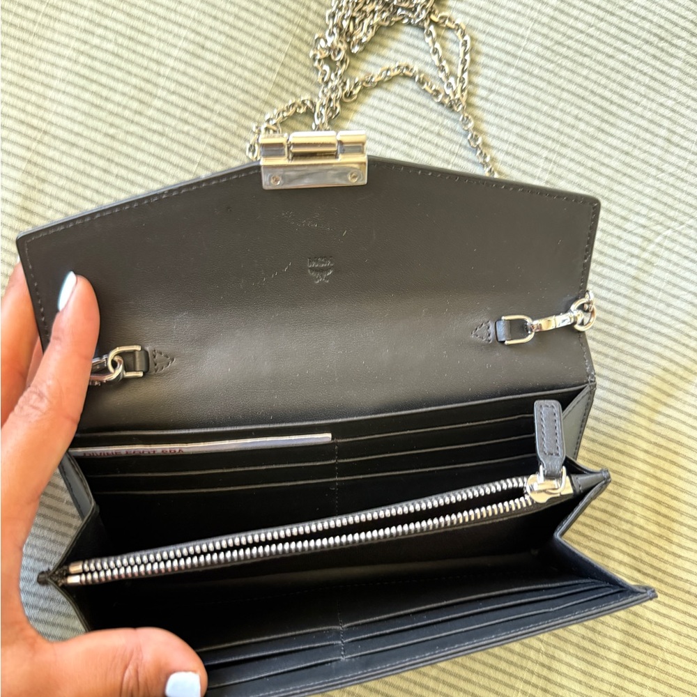 MCM Black Clutch with Gold-Tone Accents - Picture 3 of 3